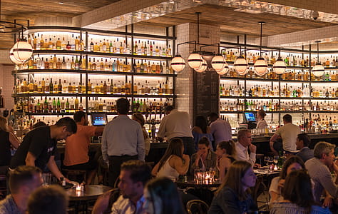 Group of People Gathering Inside Bar thumbnail