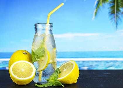 Clear Glass Jar and Citrus Fruits thumbnail