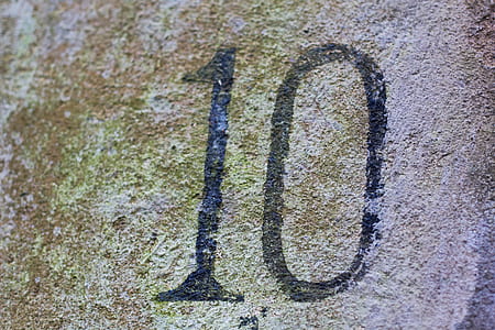 gray concrete wall with 10 art thumbnail