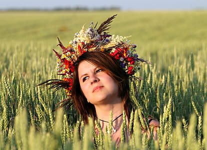 woman on grass field during daytime thumbnail