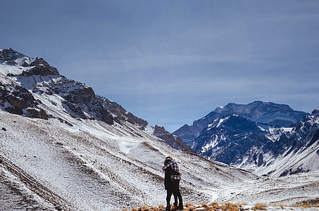 two person hugging with mountain as background thumbnail