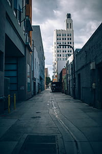pathway between concrete houses thumbnail