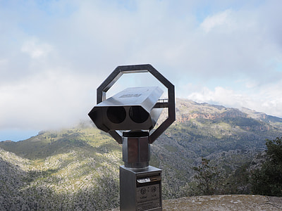 white telescope on black stand thumbnail