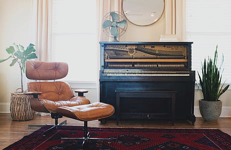 brown and white upright piano thumbnail