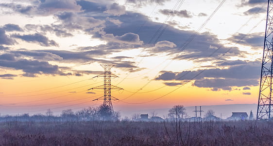 landscape photography of electric posts thumbnail