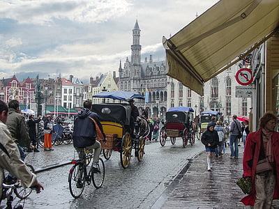 man riding bicycle near no left turn signage thumbnail