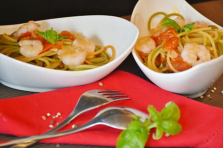cooked foods near stainless steel dining fork and spoon thumbnail