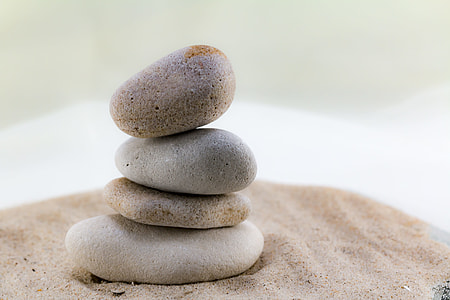 closeup photo of four gray stacked pebbles thumbnail