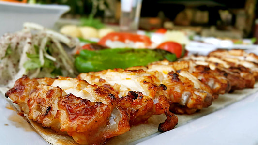 roasted meat on white table thumbnail