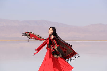 woman wearing reed and black dress thumbnail