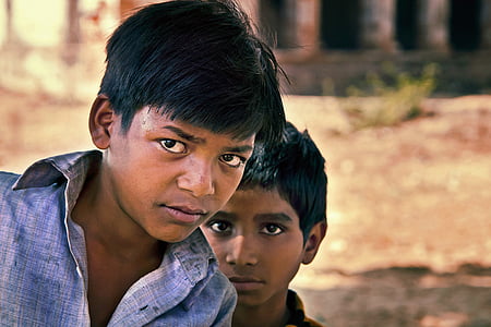 photo of two boys standing next to each other thumbnail
