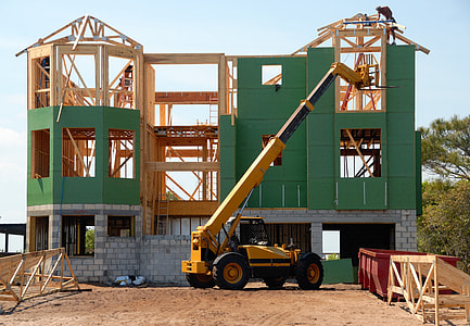 heavy equipment operating to construct a building thumbnail