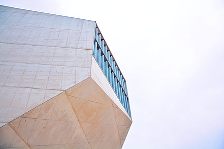 low angle photography of building during daytime thumbnail