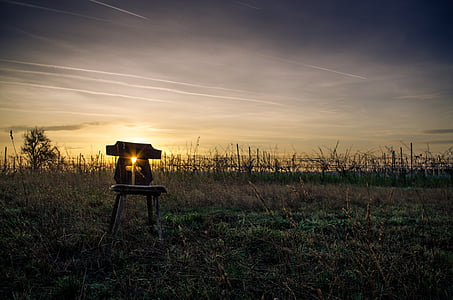 sunlight passing through concrete decor on stool thumbnail