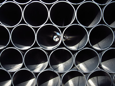 close-up photography of stacked pipes thumbnail