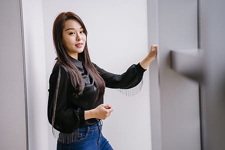 Photo of Woman Wearing Black Trumpet-sleeved Top thumbnail