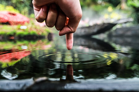 person poking water thumbnail