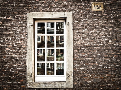 white window on building thumbnail