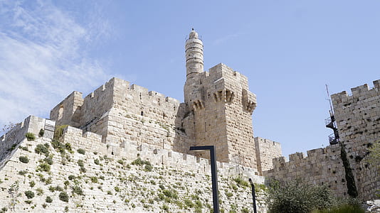 gray castle under blue sky at daytime thumbnail