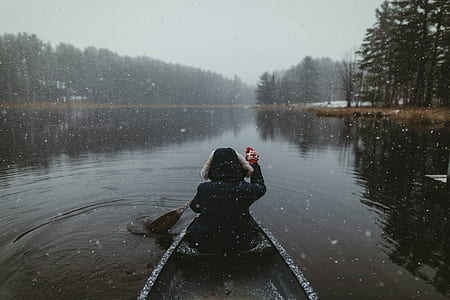 person on boat during snow thumbnail