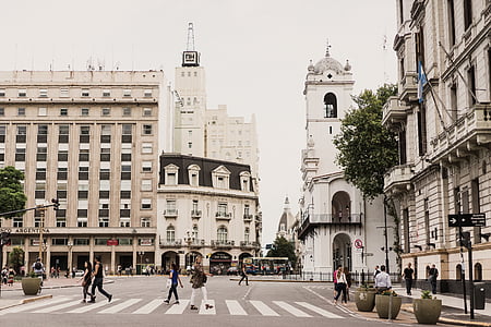 people crossing pedestrian lane at daytime thumbnail