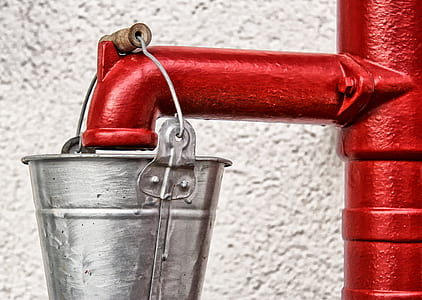 stainless steel bucket on red pipe thumbnail