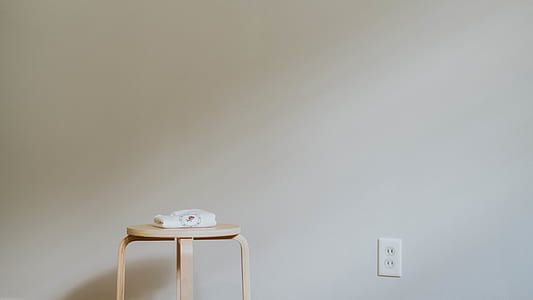 white wooden table near plug thumbnail