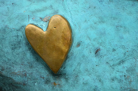 brown heart logo on teal board thumbnail