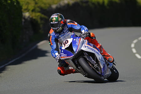 man riding blue motorcycle thumbnail