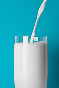 clear pint glass filled with milk thumbnail