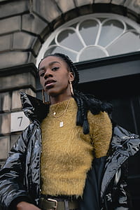 woman posing while wearing jacket thumbnail