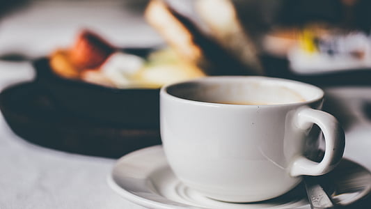 closeup photo of white ceramic teacup with coffee thumbnail