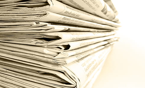 close-up photo of newspapers thumbnail