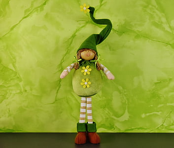 green and brown doll thumbnail
