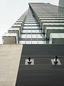 black and brown building during daytime thumbnail