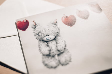 teddy bear invitation card on top of envelop thumbnail