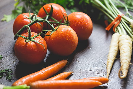 Tomatoes, Carrots And Radish On The Top Of The Table thumbnail