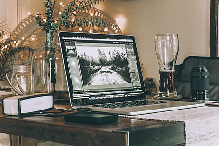 MacBook Pro on brown table thumbnail