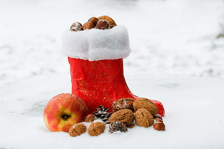 unpaired red boot with walnuts thumbnail