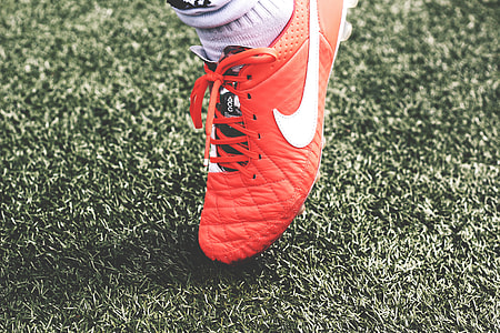 orange Nike soccer cleats thumbnail