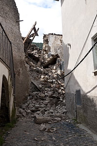 ruins of concrete building under cloudy sky thumbnail