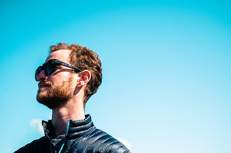 photograph of man in black leather jacket with sunglasses thumbnail