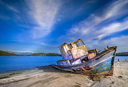 abandoned ship on seashore thumbnail