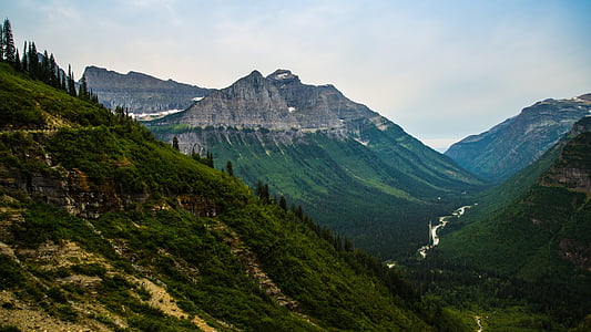 mountain ranges under white clouds thumbnail