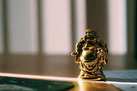 laughing buddha figurine thumbnail