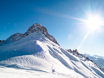 mountain full of snow during daytime thumbnail