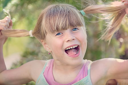 girl smiling on camera thumbnail