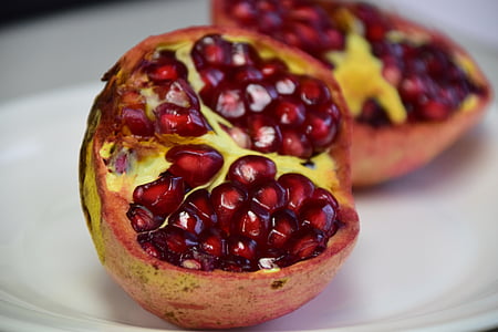 sliced of pomegranate on plate thumbnail