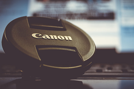 Camera lens cap on desk thumbnail