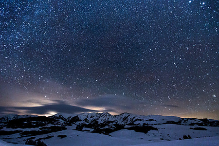 landscape photo of mountain covered by snow during nighttime thumbnail